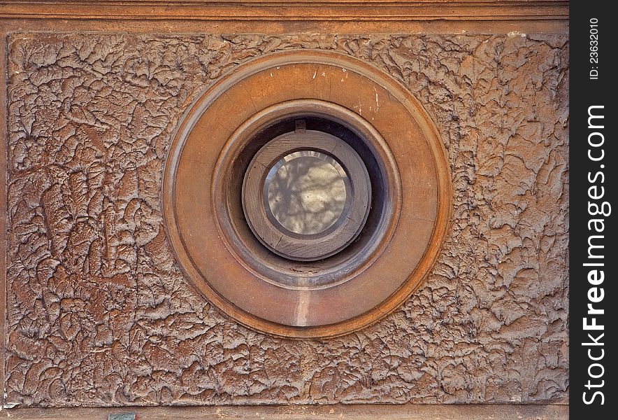 Round window on a brick wall,