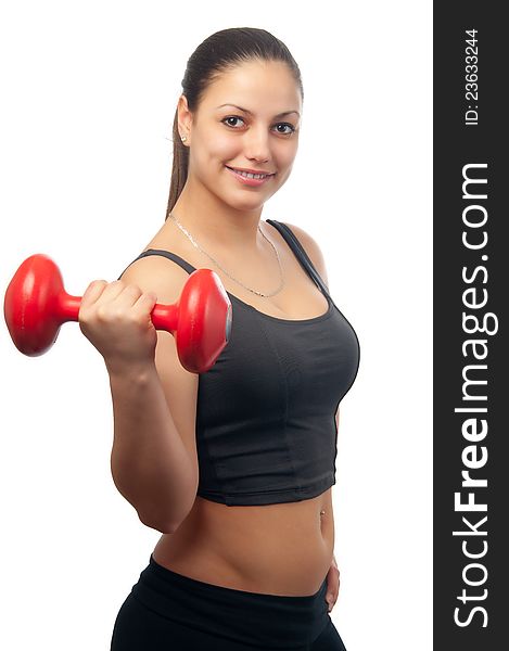 Young attractive woman exercising with red dumbbell isolated on white. Young attractive woman exercising with red dumbbell isolated on white.