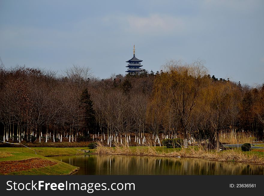 Tower and the lake，Taken in the near Jiangsu, China,In early spring morning