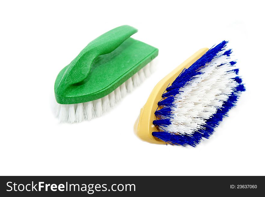 Two small brush for cleaning on a white background. Two small brush for cleaning on a white background