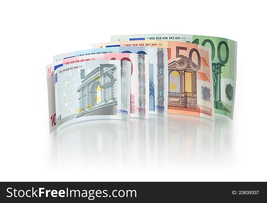 Few European bank notes standing on white background with reflection. Clipping path is included. Few European bank notes standing on white background with reflection. Clipping path is included