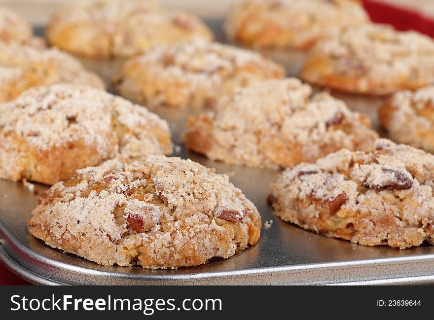 Closeup of apple nut muffins in a pan. Closeup of apple nut muffins in a pan