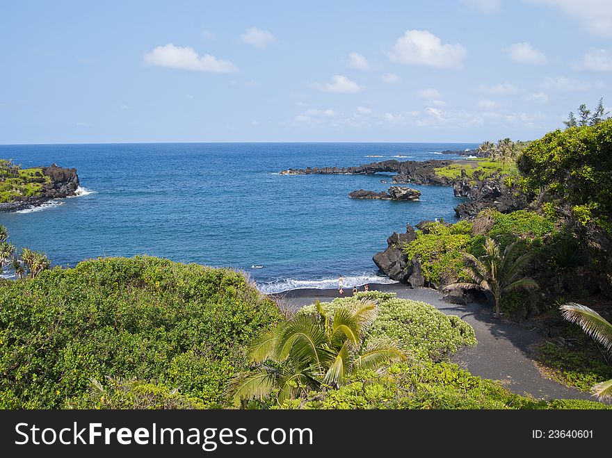 The famous beach of black stones on the island of Maui, Hawaii