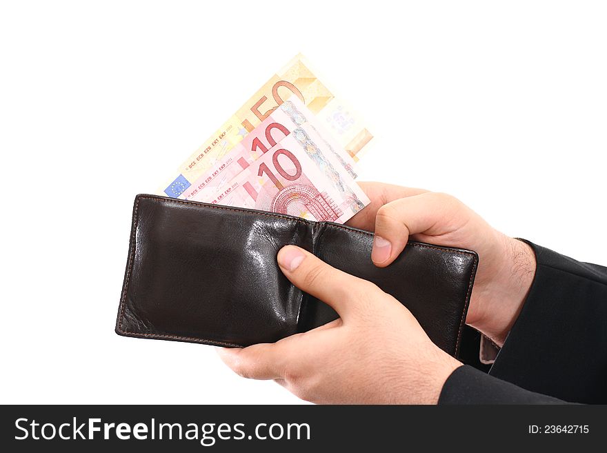 Human hands holding money out of a wallet. Human hands holding money out of a wallet