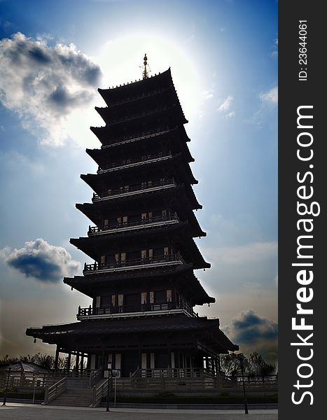 Pagoda in the sunï¼ŒTaken in Jiangsu, China, a Forest Parkï¼ŒViews of the sun through the pagoda. Pagoda in the sunï¼ŒTaken in Jiangsu, China, a Forest Parkï¼ŒViews of the sun through the pagoda