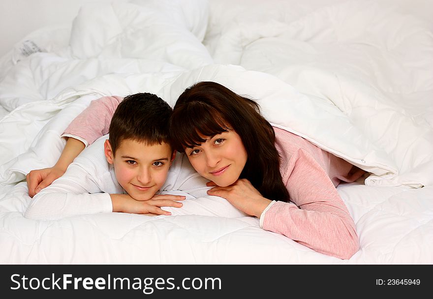Mother and son in bed
