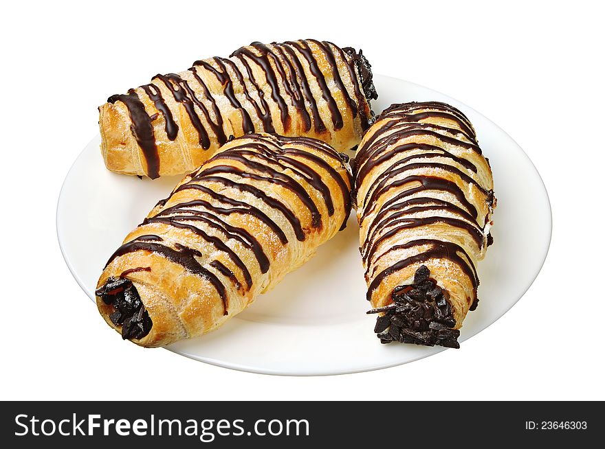 Sweet cakes with plate isolated on a white background