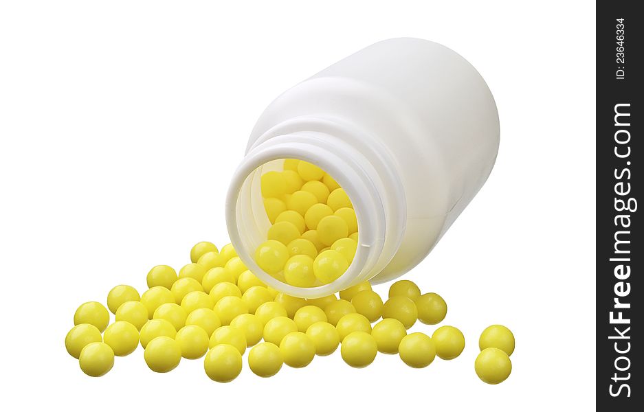 Pot of yellow vitamin isolated on a white background