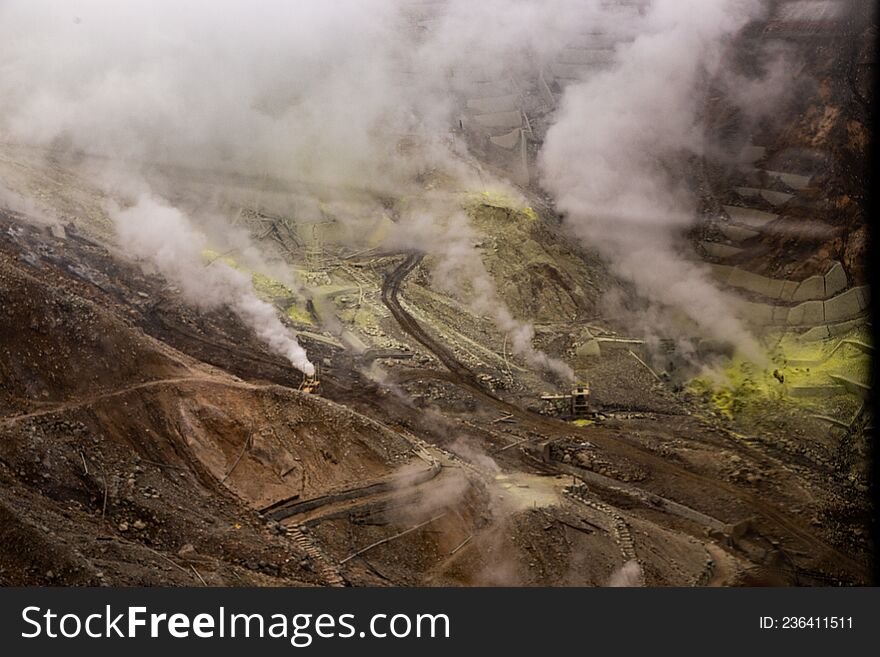 Egg-producing Factory Covered By Sulphuric Smoke In Volcanic Valley In Japan.