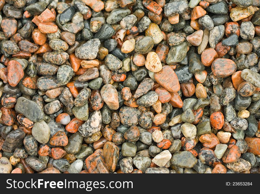 Wet pebbles on the sea beach. Wet pebbles on the sea beach.
