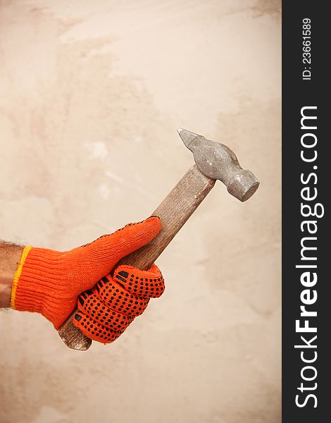 Hand with hammer