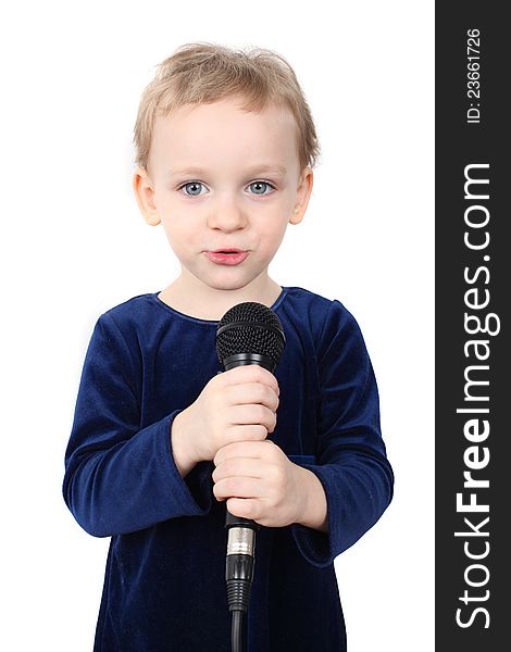 Little girl is singing with a microphone