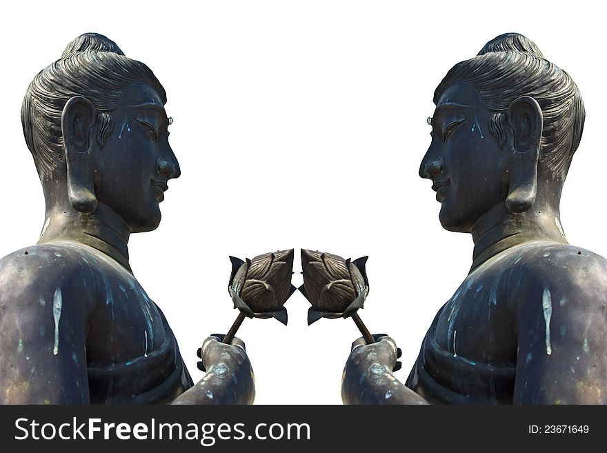 Two statues of Buddha holding a lotus on a white background. Two statues of Buddha holding a lotus on a white background.