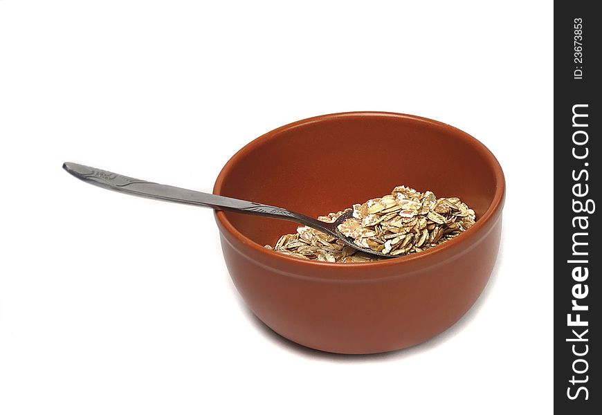 Porridge on a plate on a white background