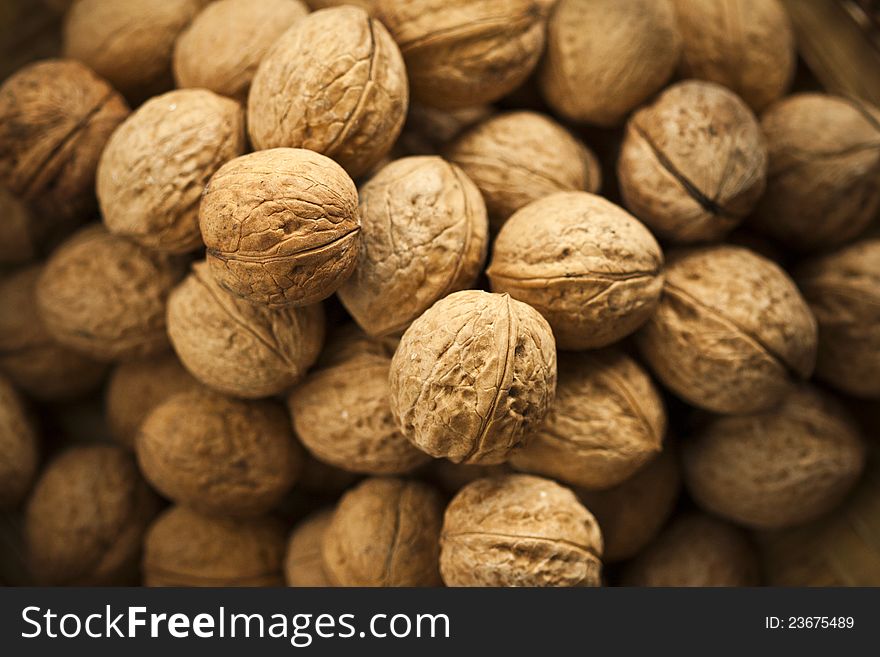 Group of walnuts on a market