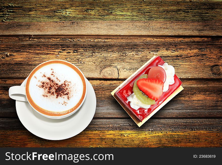 Coffee and cake on wooden table. Coffee and cake on wooden table.