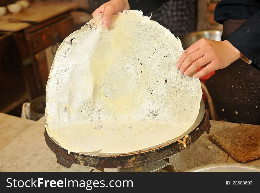 Chinese traditional pancake production methods. Chinese traditional pancake production methods