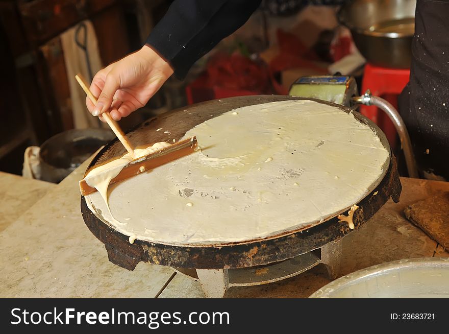 Chinese traditional pancake production methods. Chinese traditional pancake production methods