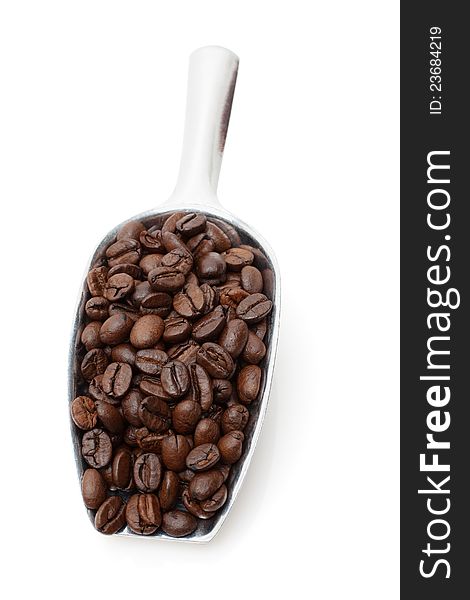 Coffee beans in metal scoop