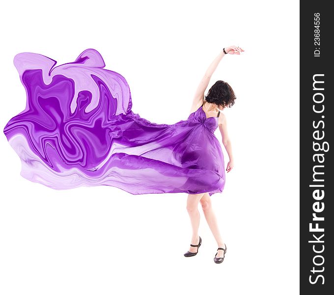 Graceful girl in flying purple silk dress on a white background