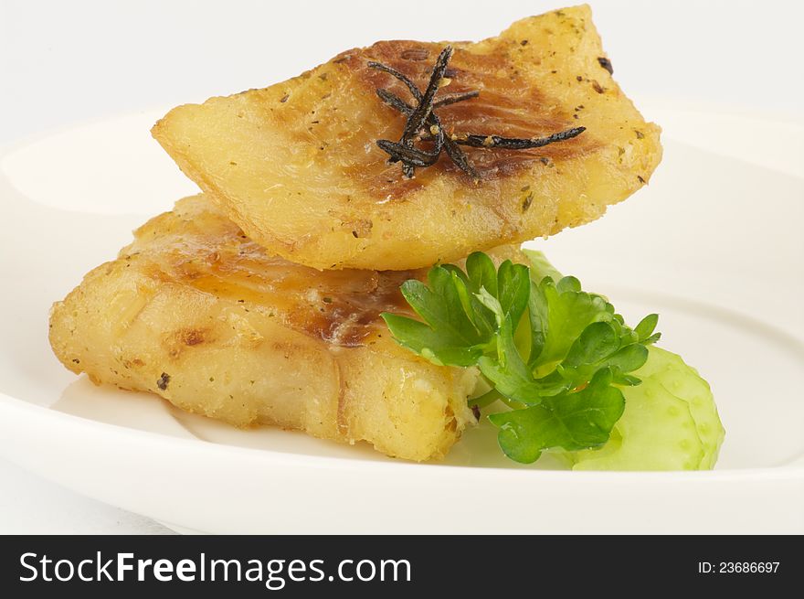 Fresh sauted cod fillet with greens and rosemary