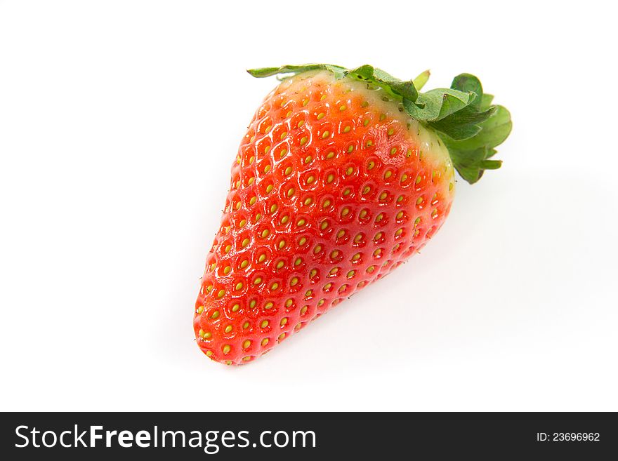 A picture of a single strawberry on a white background. A picture of a single strawberry on a white background