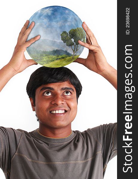 Person smiling and holding glowing ball containing ecosystem on the head. Concept of environment conservation. Person smiling and holding glowing ball containing ecosystem on the head. Concept of environment conservation.