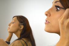 Beautiful Girl Applies Makeup Stock Photography Beautiful Girl Applies Makeup Stock Photography
