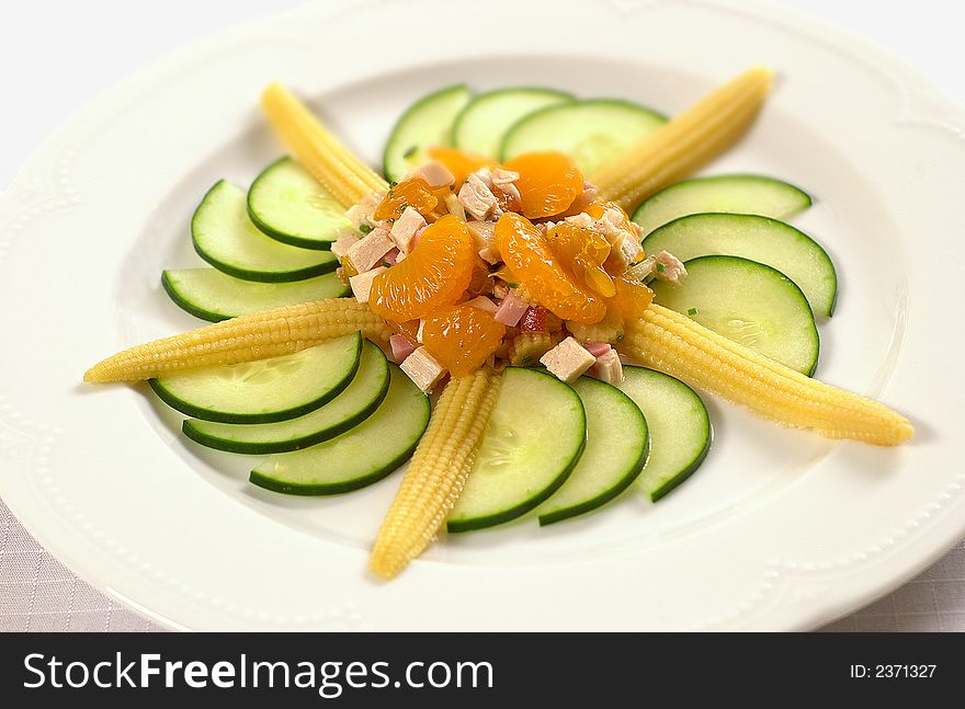 Mandarine salat with cucumber and corn