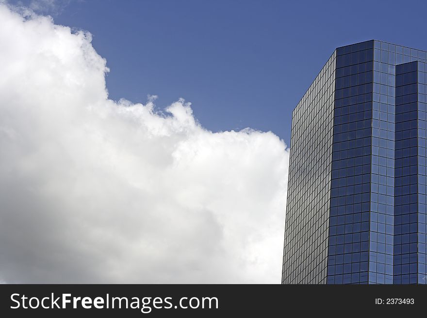 Modern office buildings in an urban settings reaches the clouds. Modern office buildings in an urban settings reaches the clouds