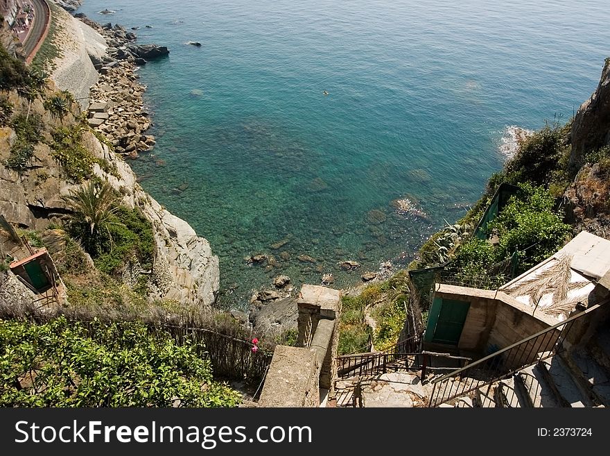 Limpid water with stair in the Mediterranean - Cinque Terre - Italy