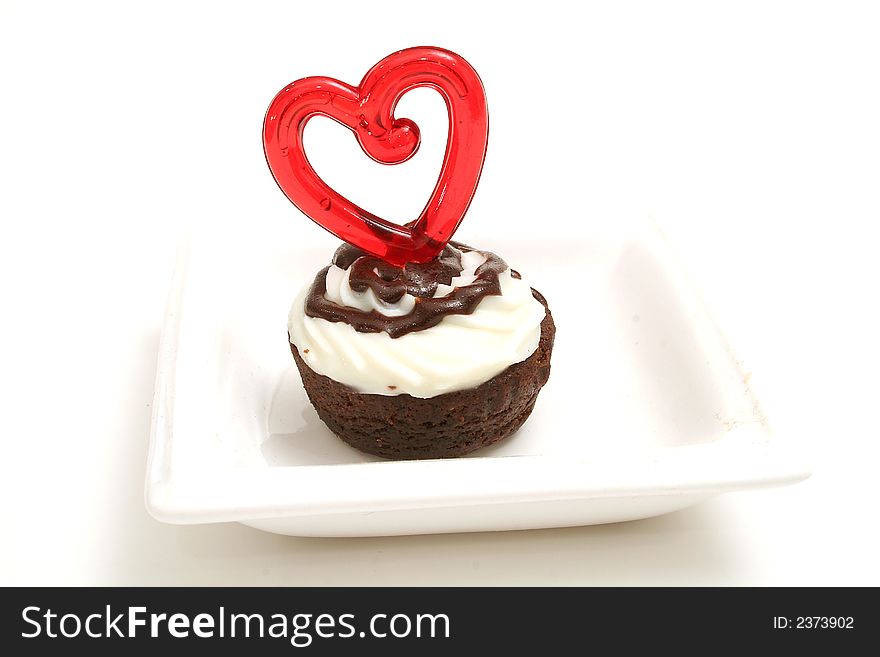 Isolated photo of a heart brownie on white