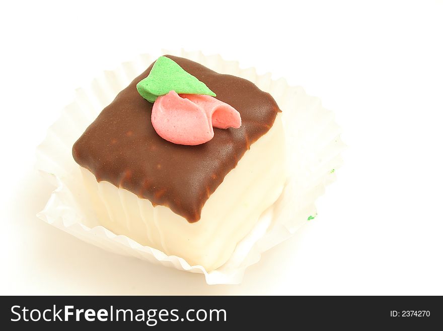 Isolated photo of a chocolate cupcake on white