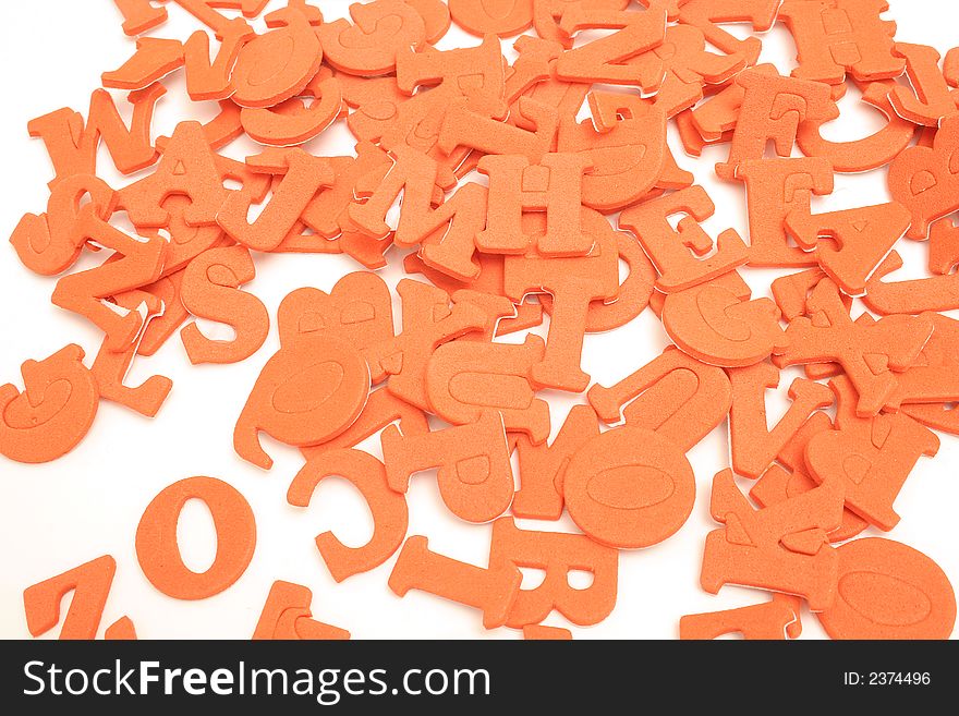 Isolated photo of scattered letters on white