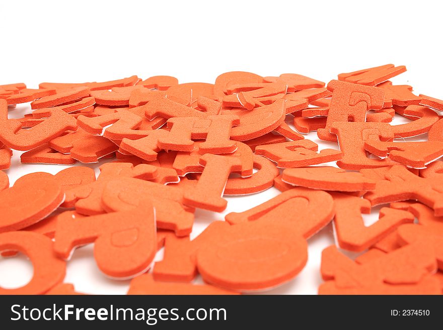Isolated photo of scattered letters on white