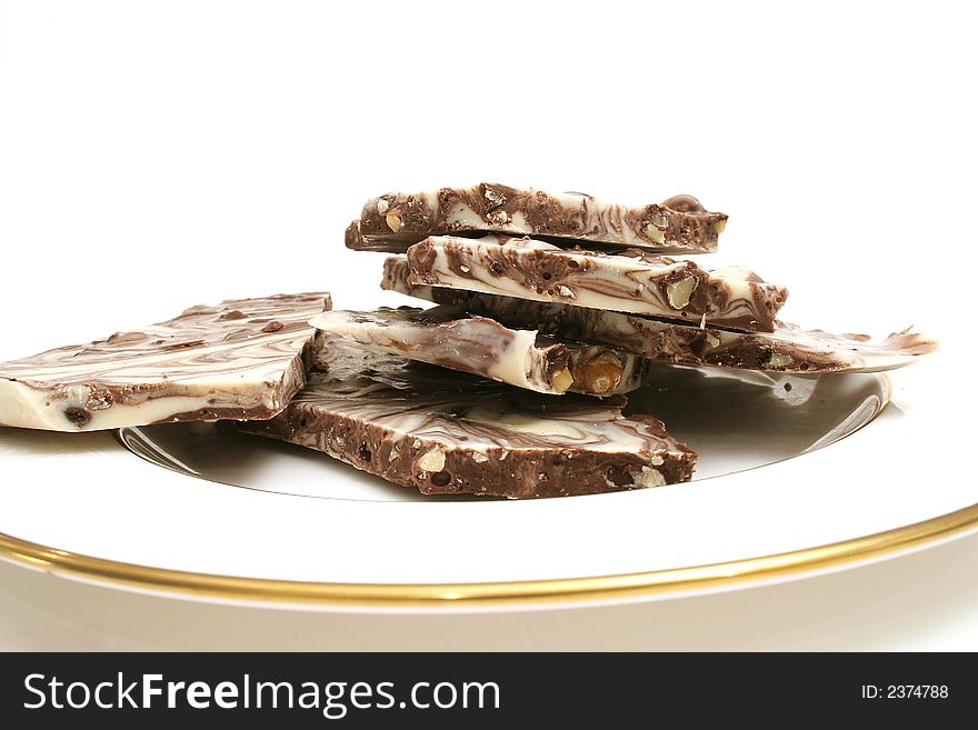 Isolated photo of chocolate candy level on white