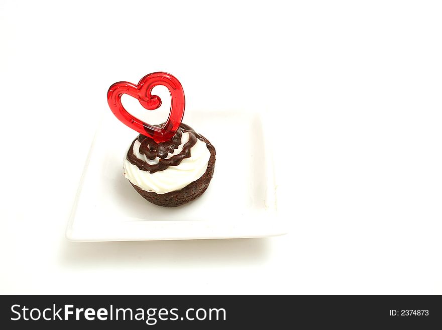 Isolated photo on white of a mini brownie bite heart