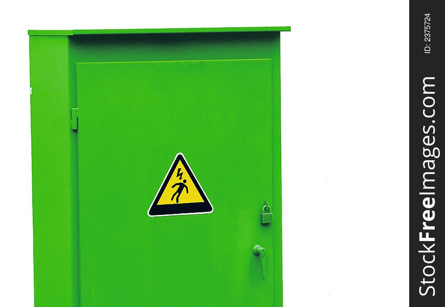 Caution to electric sign on green box. Caution to electric sign on green box