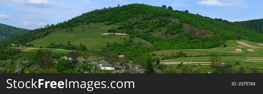 Vivid panoramic picture of the countryside in springtime. Vivid panoramic picture of the countryside in springtime