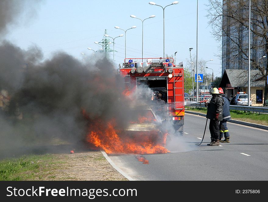 Firefighters fighting against the fire. Firefighters fighting against the fire