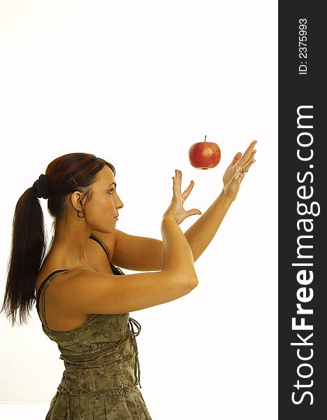 Healthy girl eating apples over a white background. Healthy girl eating apples over a white background