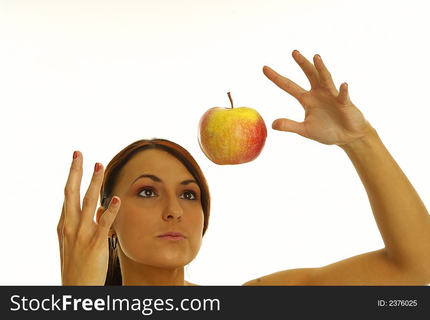 Healthy girl eating apples over a white background. Healthy girl eating apples over a white background