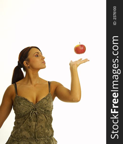 Healthy girl eating apples over a white background. Healthy girl eating apples over a white background