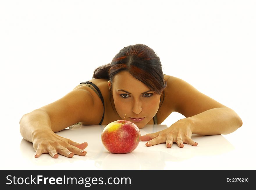 Healthy girl and apples over a white background