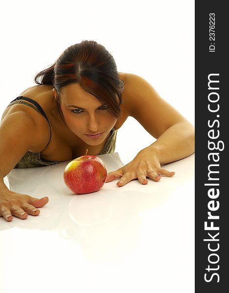 Healthy girl and apples over a white background