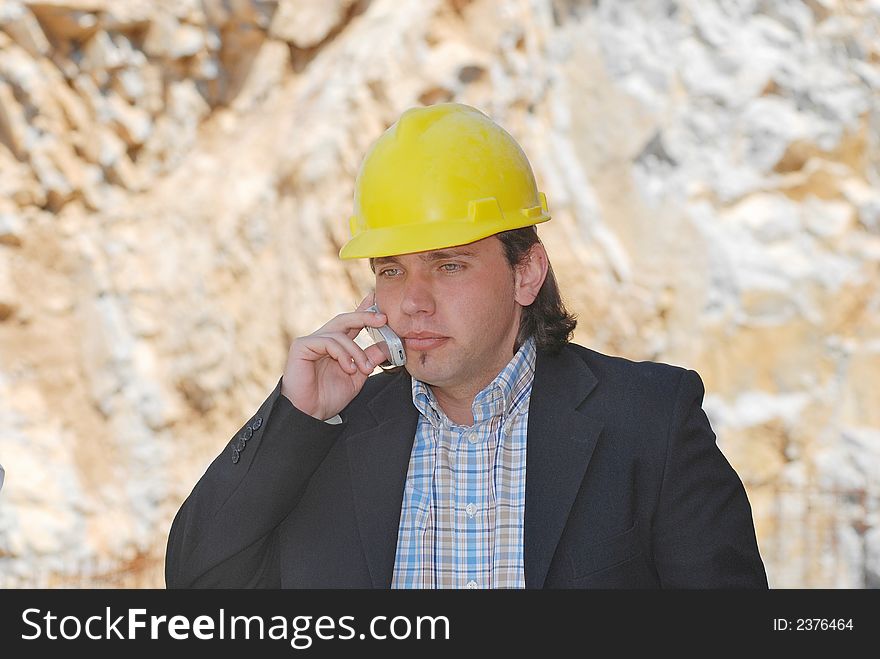 Boss talking on cell phone