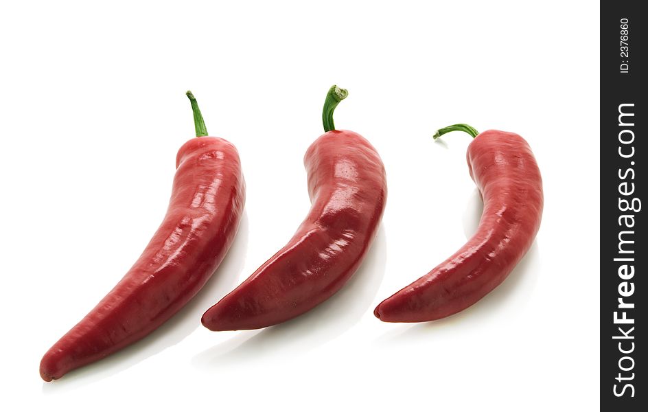 Red peppers isolated over white background