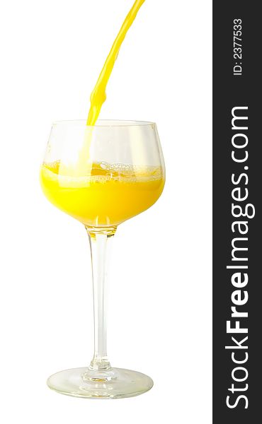 Fresh brightly yellow orange juice in glass on a white background