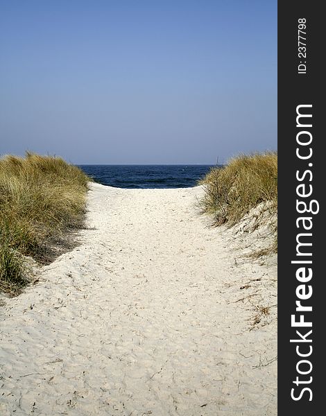 Pathway in dune with blue sky. Pathway in dune with blue sky