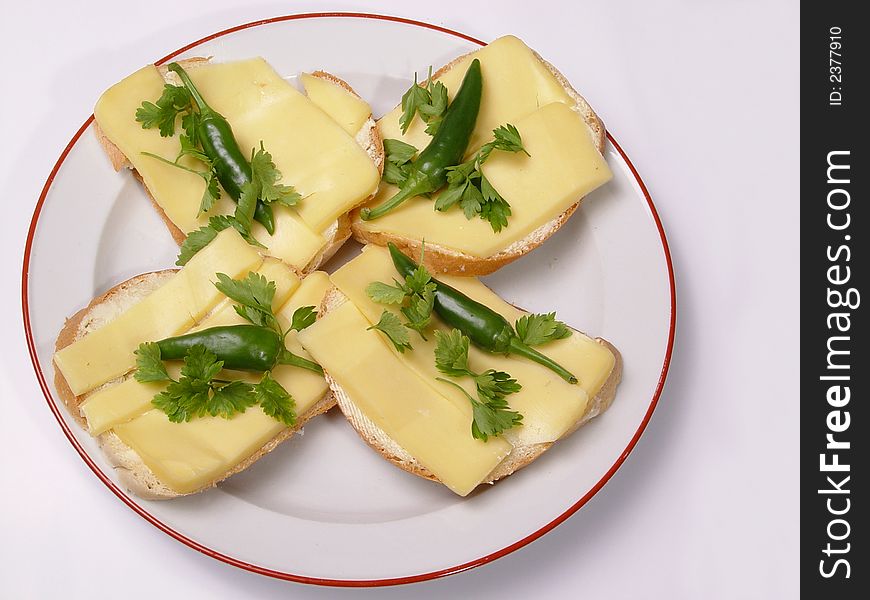 Sandwiches with butter, yellow cheese, pepper and parsley. Sandwiches with butter, yellow cheese, pepper and parsley